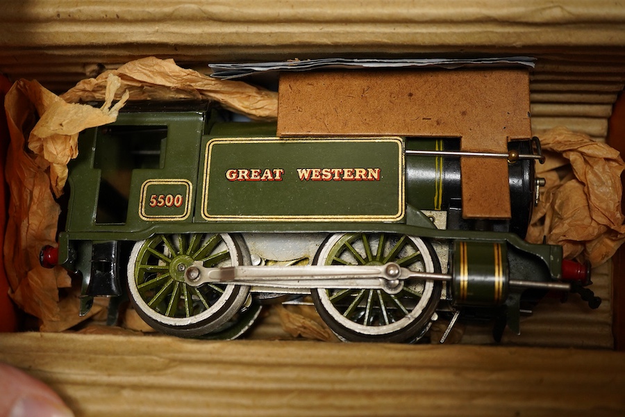 A collection of Hornby 0 gauge tinplate clockwork railway, including; a boxed No.1 Special GWR 0-4-0T locomotive, 5500, complete with original inner card packing pieces, etc., together with a boxed Dinky Toys No.1 Statio
